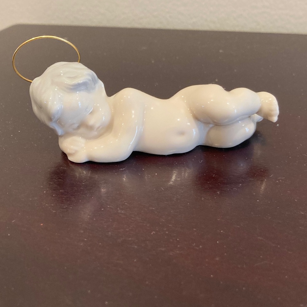 Lladro sleeping baby Jesus Porcelain Baby with Gold Halo